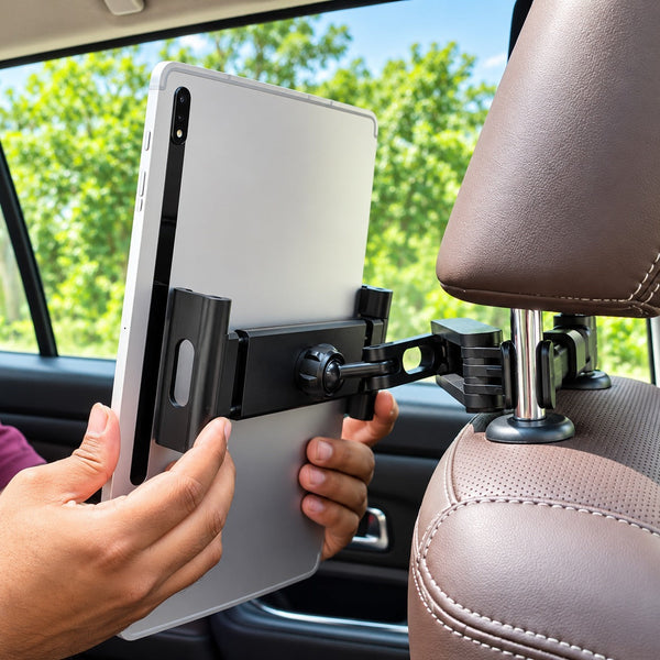 myTVS MH-5 backseat tablet holder gripping a tablet on a car headrest