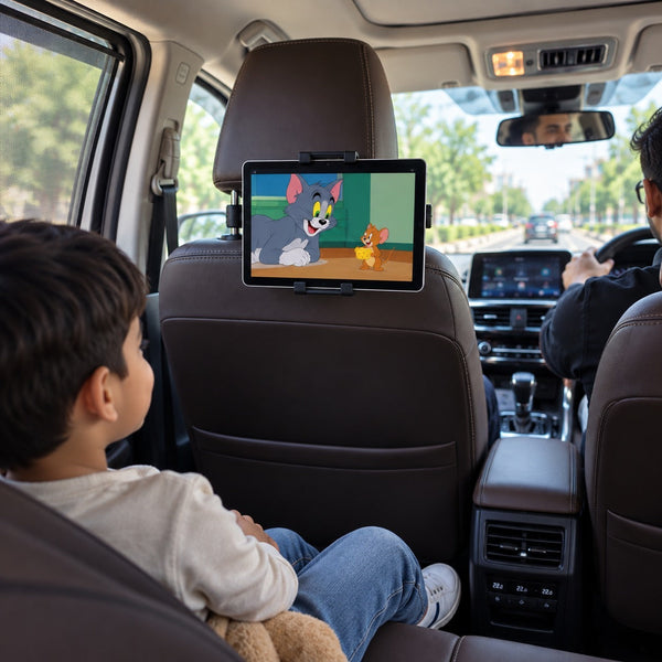Child watching a tablet held by the myTVS MH-5 backseat tablet holder on a car journey