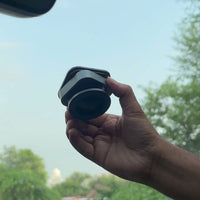 myTVS MH-4 magnetic car mobile holder in hand showing the suction cup base