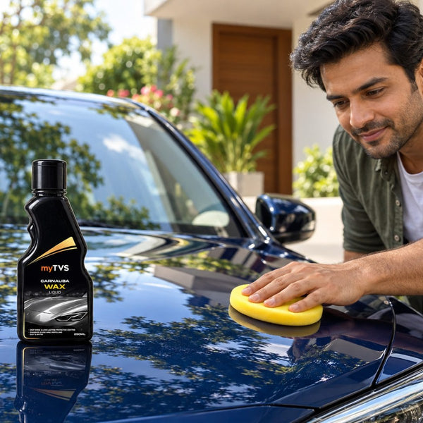 Applying myTVS Carnauba Wax Liquid to a car bonnet with a foam applicator
