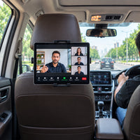 Tablet on a video call held by the myTVS MH-5 backseat tablet holder in a car