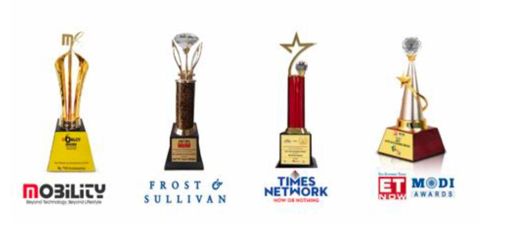 myTVS award trophies — Mobility, Frost & Sullivan, Times Network and ET NOW MODI Awards